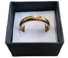 gold colored ring.