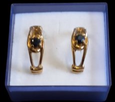 pair of vintage gold-plated earrings.