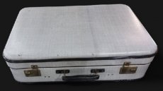 Valise grise vintage.